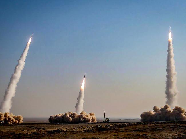 This shows a launch of missiles during a military drill in an unknown location in central Iran. Picture: AFP