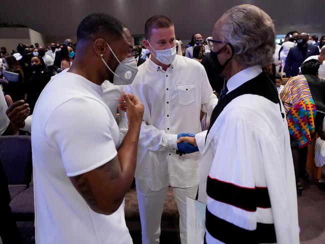 Actor Channing Tatum (centre) speaks with the Rev. Al Sharpton (right) after the funeral. Picture: AFP