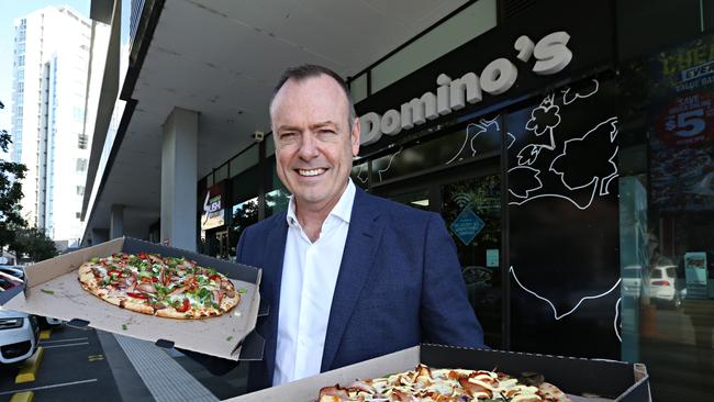 Domino's CEO Don Meij with pizzas at Domino's store. Picture: Annette Dew