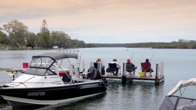 Happy holidayers fish off the private jetty at Laguna Lodge in Sussex Inlet. Picture: Andy Zakeli