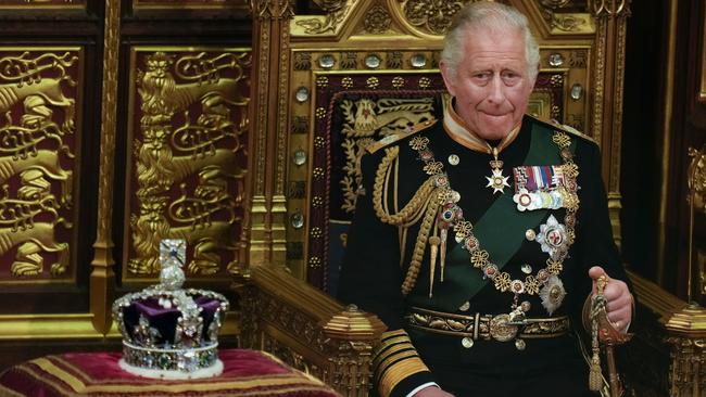 Prince Charles, the Prince of Wales, seated next to the Queen‘s Imperial State Crown in the House of Lords Chamber. Picture: Getty Images