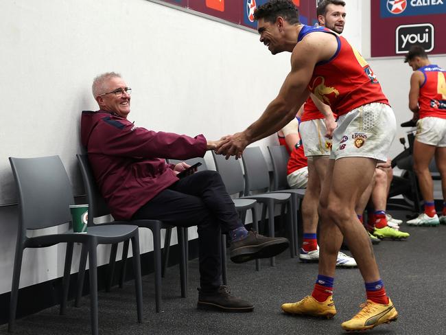 Charlie Cameron (right) and Lions coach Chris Fagan celebrate after Brisbane’s win over the Eagles. Picture: Paul Kane/Getty Images