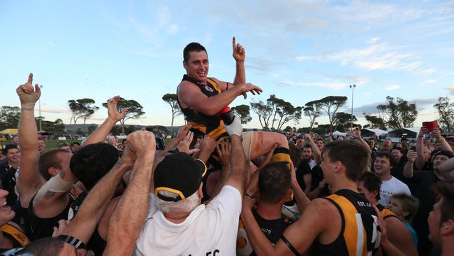 Hawthorn legend Shane Crawford helps Aldinga to a rare victory during the 2014 season against O'Sullivans Beach/Lonsdale at Aldinga Oval. Picture: Tait Schmaal.