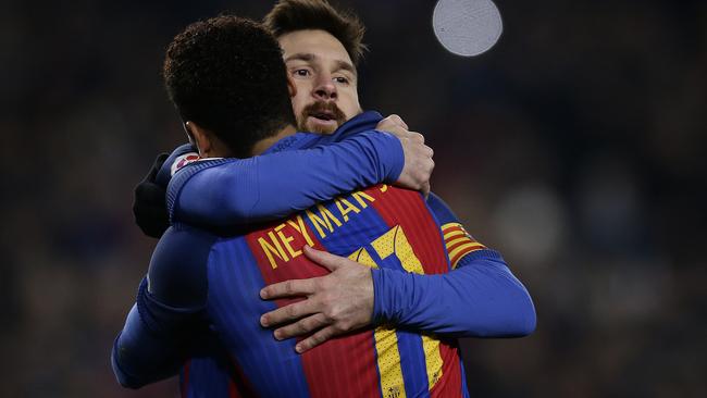 FC Barcelona's Lionel Messi celebrates with Neymar.