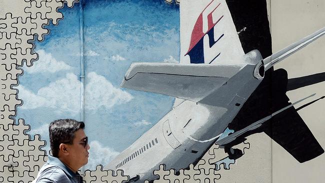 A mural of missing Malaysia Airlines MH370 plane in a back-alley in Shah Alam. Picture: AFP