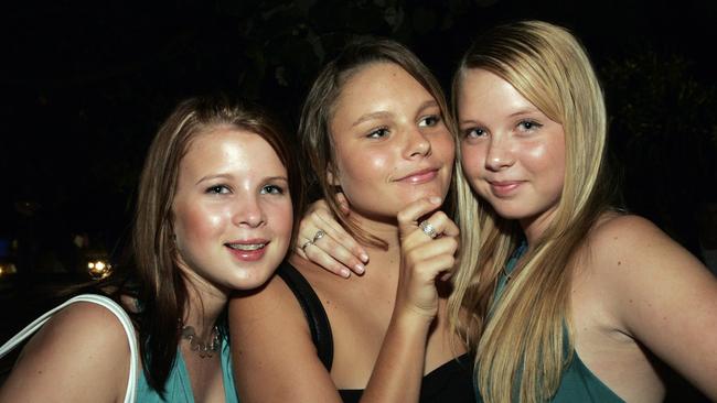 Tara Liddell, Emma Smart and Jenna Griffiths celebrate New Year’s Eve at Mooloolaba in 2005. Picture: Brett Wortman.