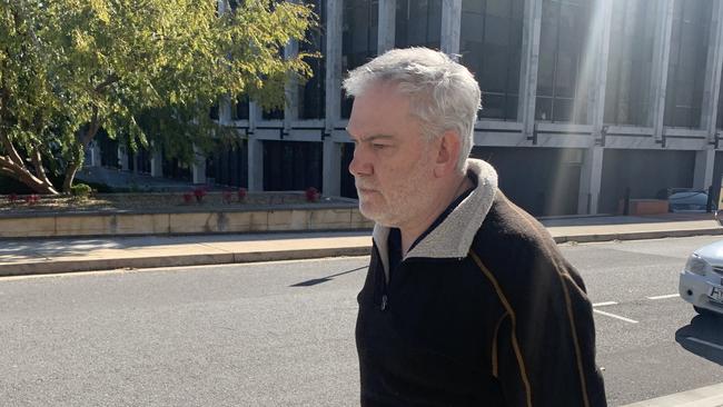 Deloitte director Cameron Tannock leaves the ACT Law Courts. Picture: Julia Kanapathippillai