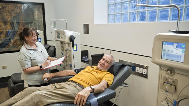 HELPING HAND: Lifeblood Toowoomba enrolled nurse Sonya Glaser checks on Alan Yorkston as he prepares for his plasma donation. Picture: Kevin Farmer