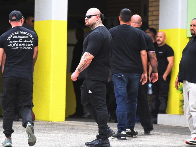 Tattooed men dressed in black outside the mosque where mourners paid their respects to Mick Hawi. Picture: AAP.