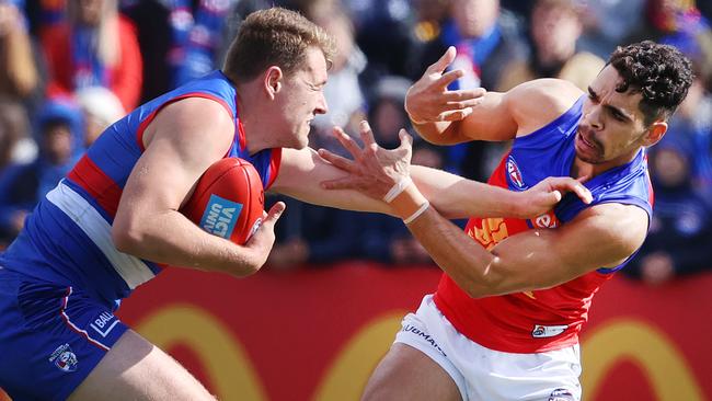 Jack Macrae and Charlie Cameron will face off at the Gabba on Saturday night. Picture: Michael Klein