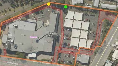 Subject site and proposed facility location (monopole = yellow dot, cabinets = green dot). An application to place a phone tower at the rear of the Urangan Central Shopping Centre was only narrowly approved by the Fraser Coast Regional Council this week because it would be 500m from a childcare centre.<b/>