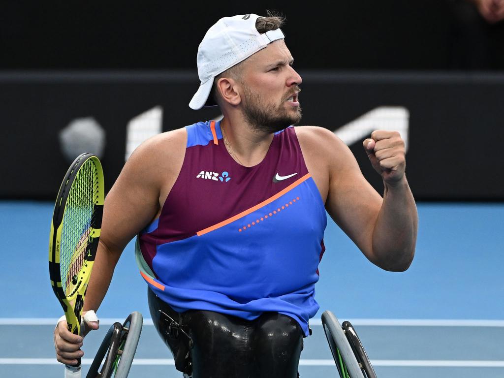 Dylan Alcott celebrates after winning a point at the 2022 Australian Open. Picture: Quinn Rooney/Getty