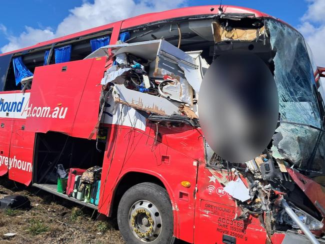 Photographs taken in the immediate aftermath of a horror fatal Greyhound passenger bus crash at Gumlu on the Bruce Highway south of Ayr on Sunday. The bus driver, picture, miraculously survived. The bus carrying 33 passengers was travelling north when it collided head on with a caravan being towed by a four-wheel drive driven by an elderly couple. Three passengers on the bus were killed while two others remained in critical conditions in Townsville University Hospital on Monday morning. Picture: Supplied