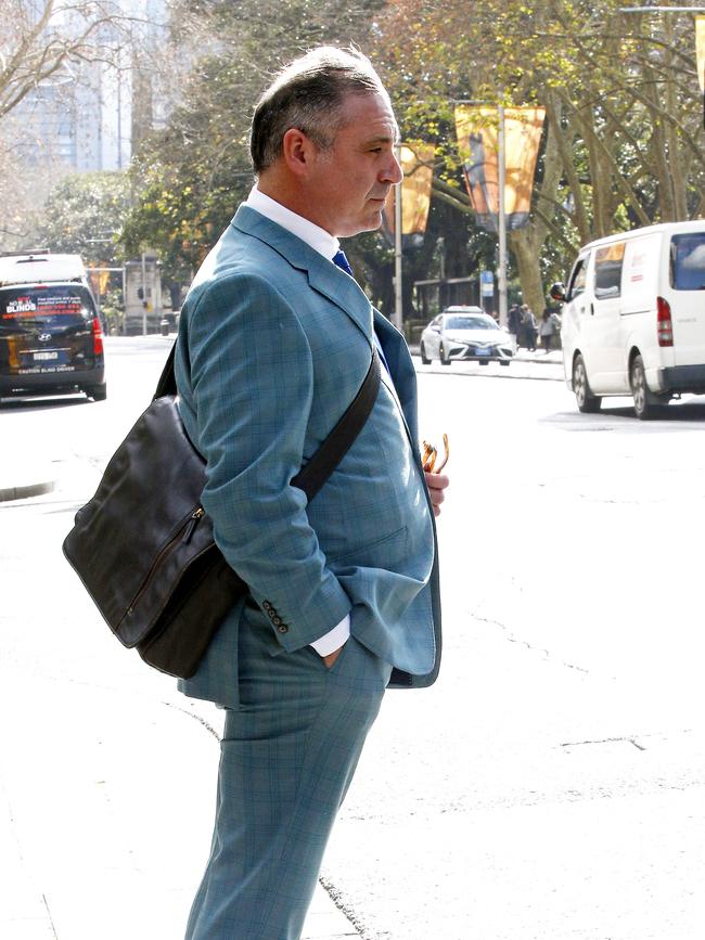 Andrew O'Keefe leaves Downing Centre Court after being sentenced to a 12-month Conditional release order after pleading guilty to driving with a suspended licence. Picture: NewsWire / John Appleyard