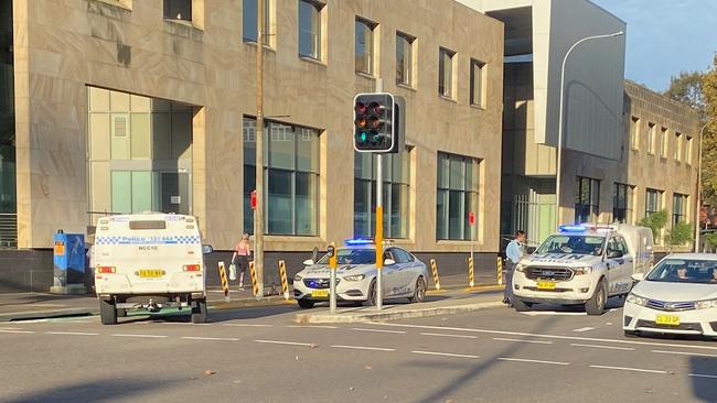 Police at the intersection of Hunter Street and Steel Street at Newcastle West moments after the arrest on Wednesday afternoon. Picture: Peter Lorimer