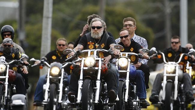 Fellow club members leaving the funeral of Ross Brand.