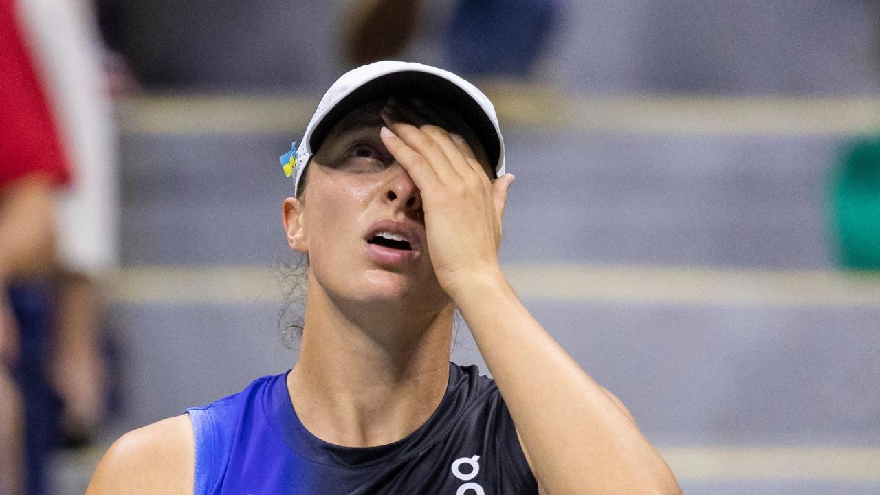 Poland's Iga Swiatek sits between games during the US Open tennis tournament women's singles round of 16 match against Latvia's Jelena Ostapenko at the USTA Billie Jean King National Tennis Center in New York City, on September 3, 2023. (Photo by COREY SIPKIN / AFP)