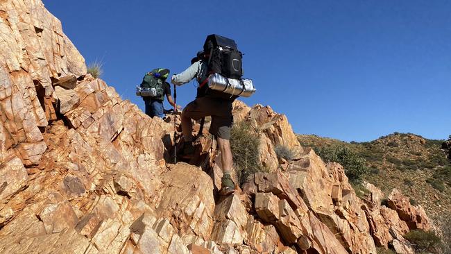 Larapinta Trail: Trekkers on ridgetop near Brinkley Bluff in the Northern Territory. Picture: Ryan Cox