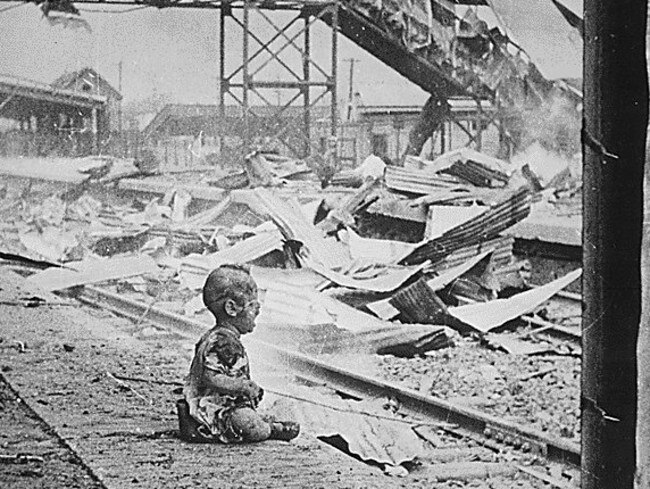 Foretaste of horror to come ... HS Wong’s picture of an injured Shanghai toddler in the moments after a Japanese air raid.