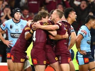 BRISBANE, AUSTRALIA - JULY 13:  Kurt Capewell of the Maroons celebrates with team mates after scoring a try during game three of the State of Origin Series between the Queensland Maroons and the New South Wales Blues at Suncorp Stadium on July 13, 2022, in Brisbane, Australia. (Photo by Chris Hyde/Getty Images)