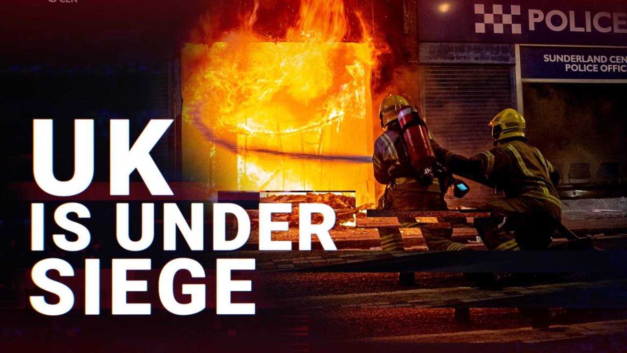 Under siege: Violent race riots erupt on the streets of the UK