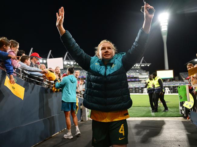 Clare Polkinghorne acknowledges Matildas fans after her final appearance for Australia. Picture: Quinn Rooney/Getty Images