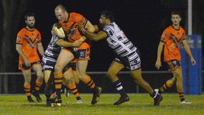 Wests Tigers front rower Andrew Dunkley runs the ball against Townsville Brothers. Photo: Callum Dick