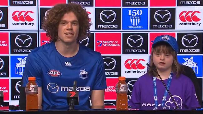 Ben Brown with his cousin, Grace, at the Roos’ post-match press conference.