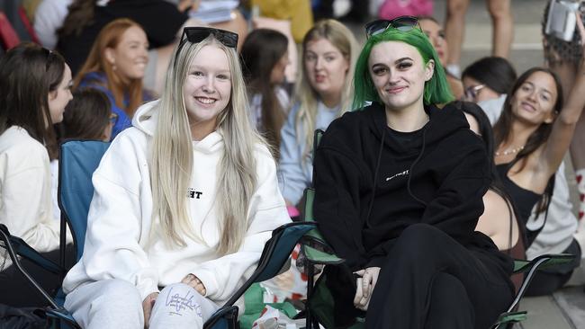 Tahlia Robin and Rayne Wrighton-Smith at the front of the queue for the Harry Styles concert. Picture: Andrew Henshaw