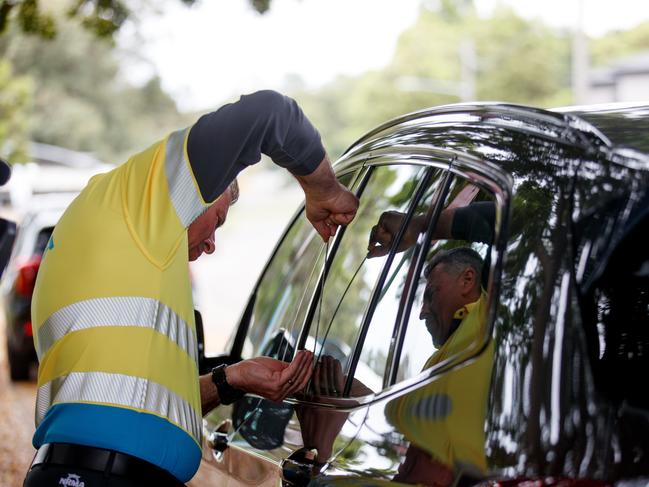 SYDNEY, AUSTRALIA - NewsWire Photos DECEMBER 3, 2024: NRMA Patrol member Tony Tamine unlocks a car on Tuesday. As hot summer temperatures continue the NRMA warns of the dangers of locking children and pets in cars. Picture: NewsWire / Nikki Short