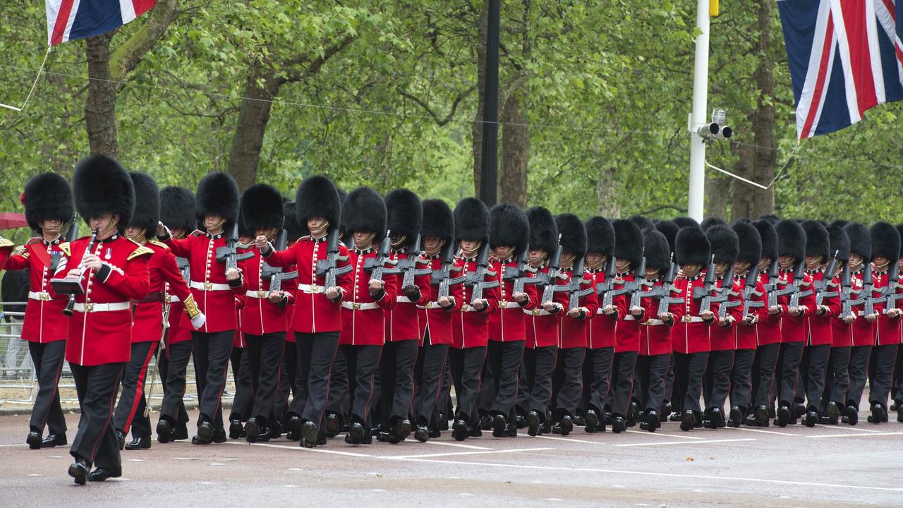 Their hats may be funny but be warned, the Queen’s Guard are trained military members. Picture: Miguel Medina/AFP.