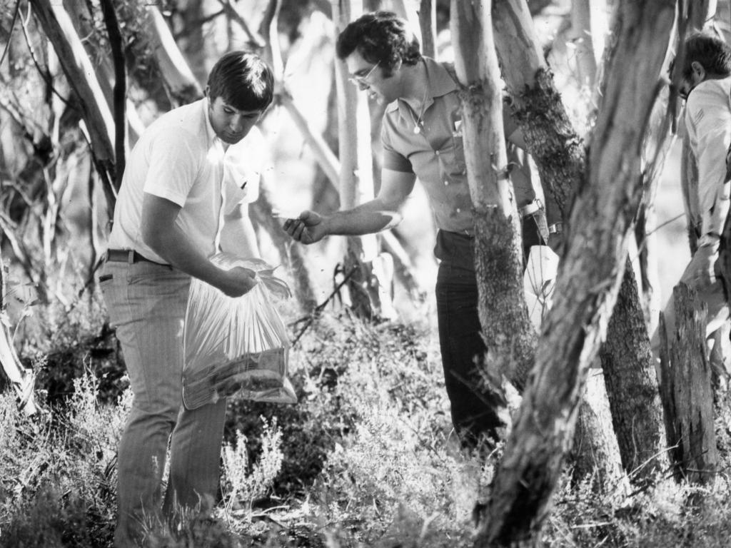 Police with two handbags found about 4.5km east of the main search area at Truro on April 27, 1979.