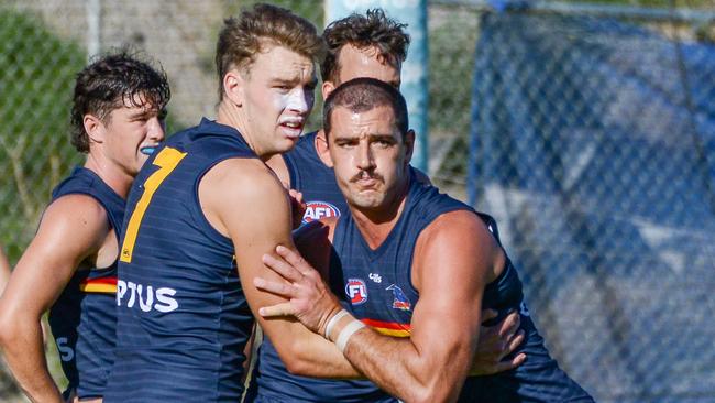 Riley Thilthorpe and Taylor Walker battle at Crows training.