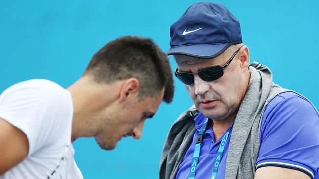 Bernard Tomic with his father John. Picture: Getty Images 