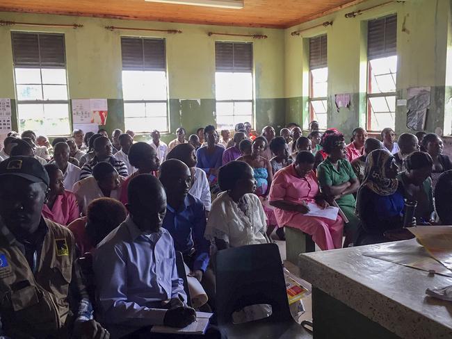 Hospital staff and others are briefed on how to keep themselves safe at Bwera hospital, where the confirmed and suspected cases of Ebola are being treated in Kasese District, western Uganda, near the border with Congo. Ben Wise/International Rescue Committee via AP)