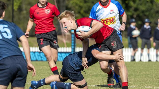 Angus Kelly is tackled in the GPS 1st XV Rugby game between Brisbane Grammar and Gregory Terrace at Northgate, Saturday, July 30, 2022 - Picture: Richard Walker