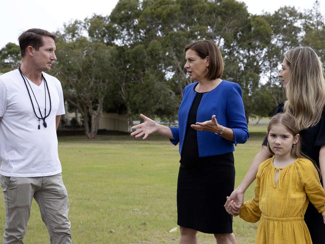 Gold Coast AUSTRALIA - NewsWire Photos October 22, 2020: Queensland opposition LNP leader Deb Frecklington and Currumbin LNP Laura Gerber with daughter Lily 7 speak with local dad Benny Morrison (left) . The LNP announced increased funding for before and after school care. : NCA NewsWire / Sarah Marshall