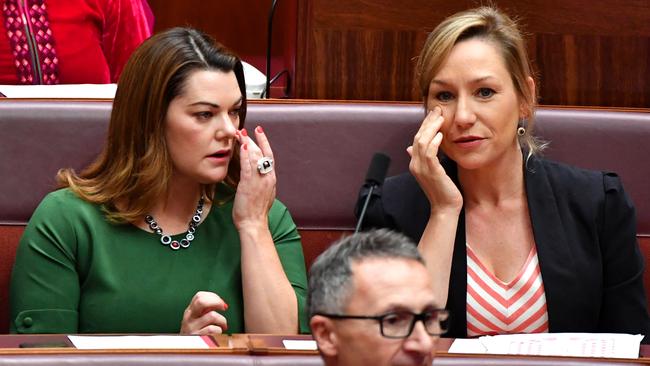 Senator Sarah Hanson-Young, Senator Larissa Waters and Senator Richard Di Natale (centre, foreground) put their heads together in Canberra this week. Picture: AAP