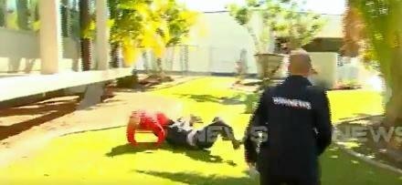 TACKLE: Detective Senior Sergeant Daren Edwards cuts down the pest. Picture: 7News Sunshine Coast