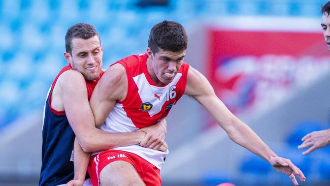 Tom McCallum (red and white) is a Clarence product. Picture: Richard Jupe