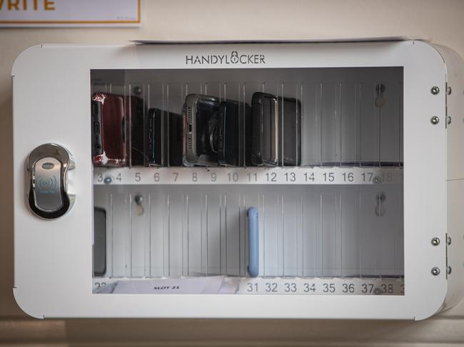 At Ashfield Boys High School, students are made to deposit their phones in glass lockers for the whole of their school day. Picture: Julian Andrews