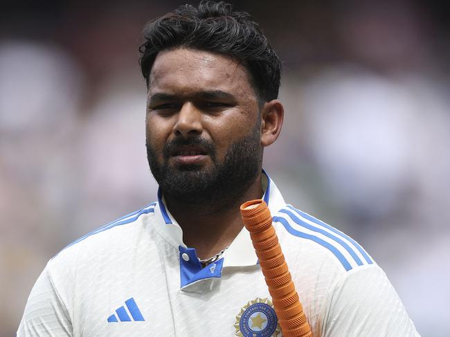 India's Rishabh Pant leaves the field at the tea break on day five of the fourth cricket Test match between Australia and India at the Melbourne Cricket Ground (MCG) in Melbourne on December 30, 2024. (Photo by Martin KEEP / AFP) / -- IMAGE RESTRICTED TO EDITORIAL USE - STRICTLY NO COMMERCIAL USE --