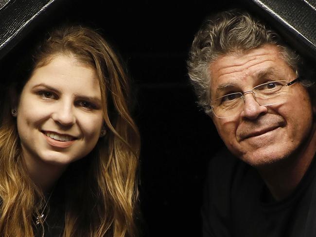 Last year's line honours winner Comanche with owner/skipper Jim Cooney with his daughter Julia in the Balast pumping section. Picture by Chris Pavlich for The Australian