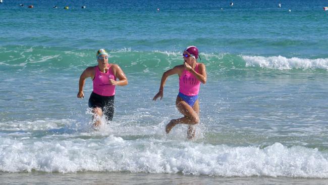 Allana Glowaski charges to the finish line in the surf race at the Point Danger Branch senior championships at Greenmount beach. Pic: Salty Glow Photography