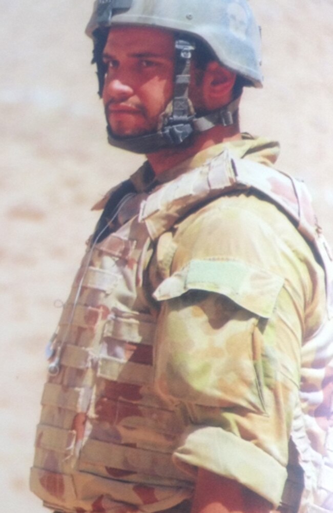 Jesse Bird in combat in Afghanistan in 2009.