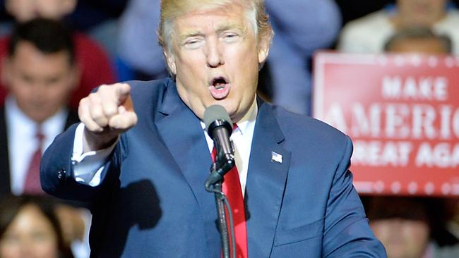 FAYETTEVILLE, NC - DECEMBER 06: President-elect Donald Trump addresses an audience at Crown Coliseum on December 6, 2016 in Fayetteville, North Carolina. Trump took time off from selecting the cabinet for his incoming administration to celebrate his victory in the general election. Sara D. Davis/Getty Images/AFP == FOR NEWSPAPERS, INTERNET, TELCOS & TELEVISION USE ONLY ==