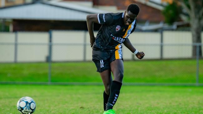 Jok Ayii fires off a pass for West Wanderers.