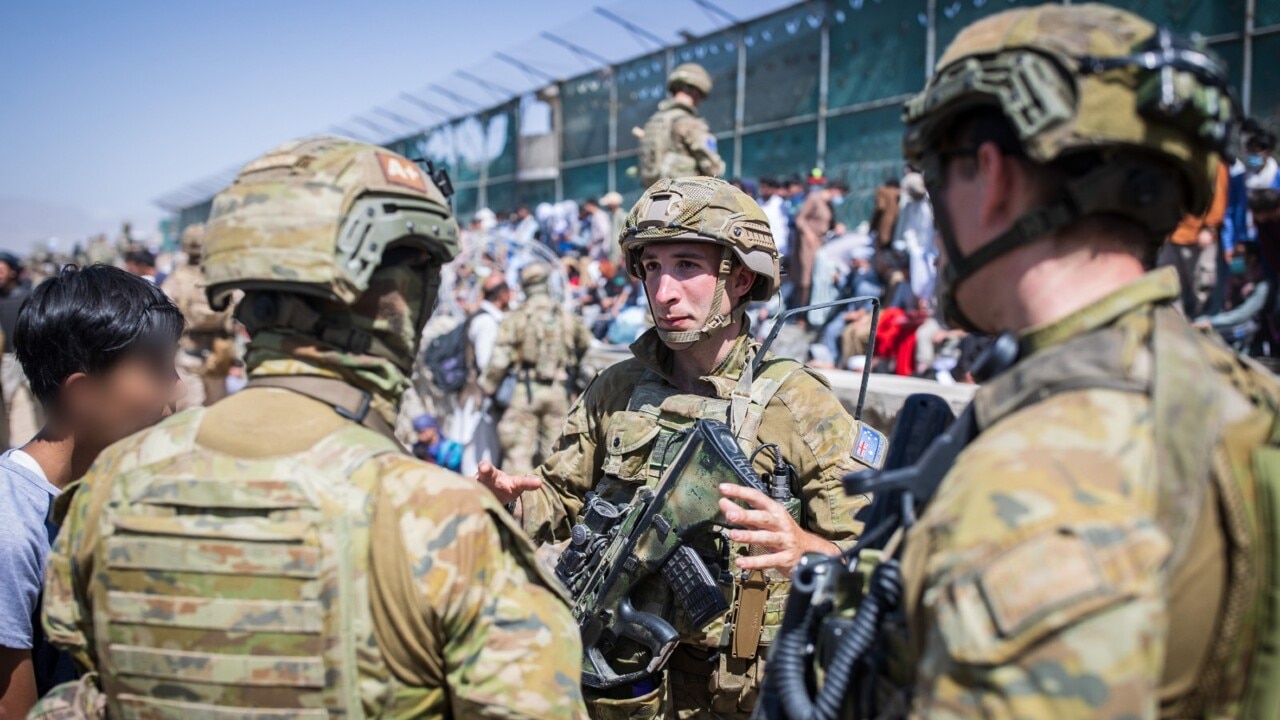 PM meets with 'the very troops' that helped evacuation efforts during fall of Kabul