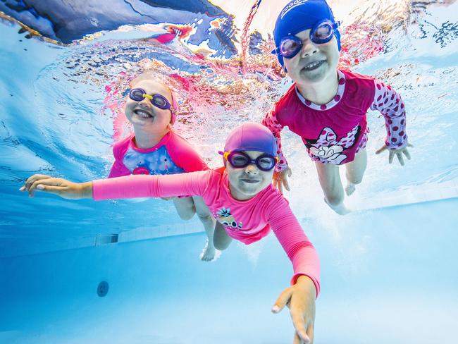 Earnshaw State College preps Mikayla Atkinson, Bianca Willis and Elenor Smith having fun in the pool. Picture: Nigel Hallett