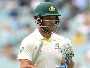 OUT: A dejected Aaron Finch leaves the field after being dismissed at the MCG against India. Picture: HAMISH BLAIR/AAP PHOTOS